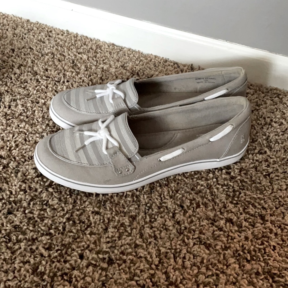 DSW gray slip on boat shoes with cute tied bow.